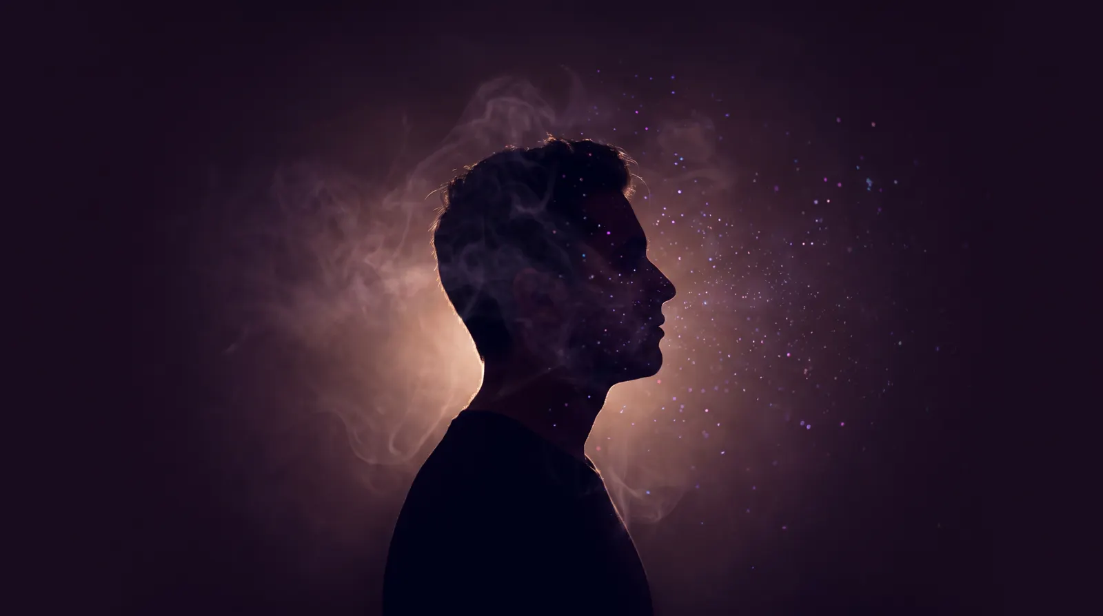 A calm silhouette with soft mist dissolving into glowing lavender particles.