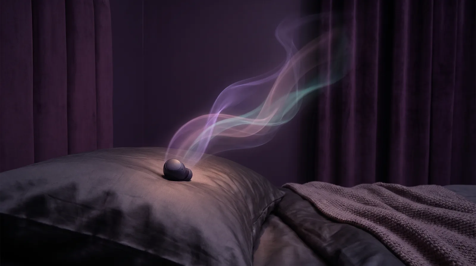 A single earbud resting on a pillow releasing ribbons of lavender and aqua soundwaves that drift through a near-black aubergine bedroom.